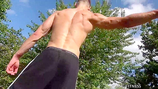 Ripped Adonis Flexes Bulging Muscles for EastBoys in Scorching Gay Fitness Fantasy