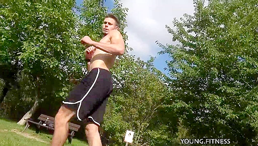 Ripped Adonis Flexes Bulging Muscles for EastBoys in Scorching Gay Fitness Fantasy