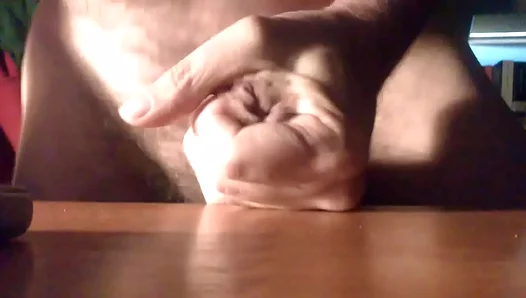Climax Explosion: Sticky Handjob Ends in Messy Load Splash on Table