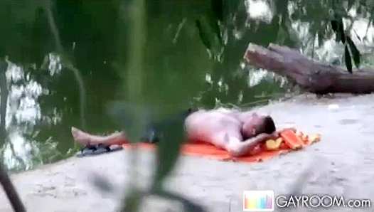 Steamy Lakefront Action: Hung Studs Share Massive Dicks Ending in Slick Cumshot Facial
