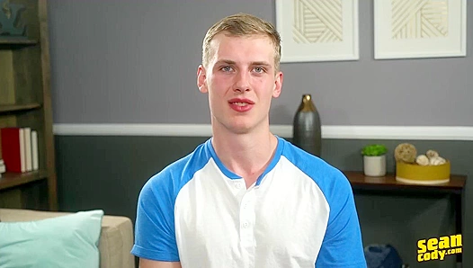 Blonde Stallion Micks Powerful Load Drenches His Kneeling Form – SeanCody.com